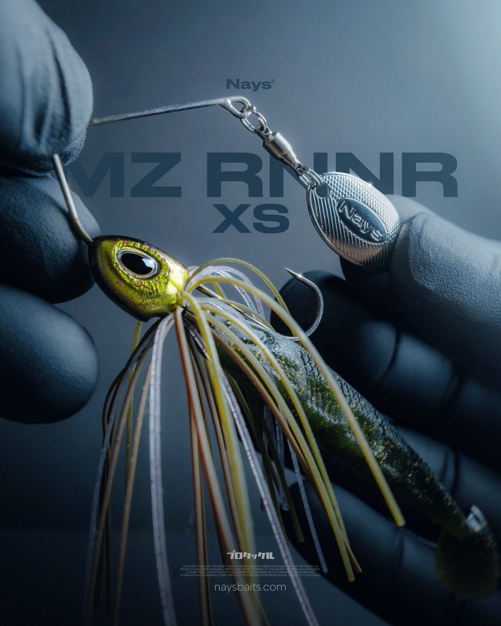 Nays MZ RNNR XS Spinnerbait mit goldenem Kopf und Gummifisch-Trailer.