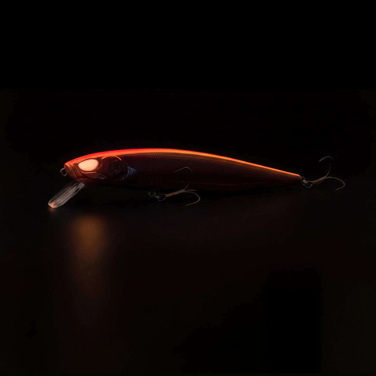 Nays VMPR 130 Zanderwobbler - UV-aktiver Hardbait für trübes Wasser, leuchtendes Rot-Orange.